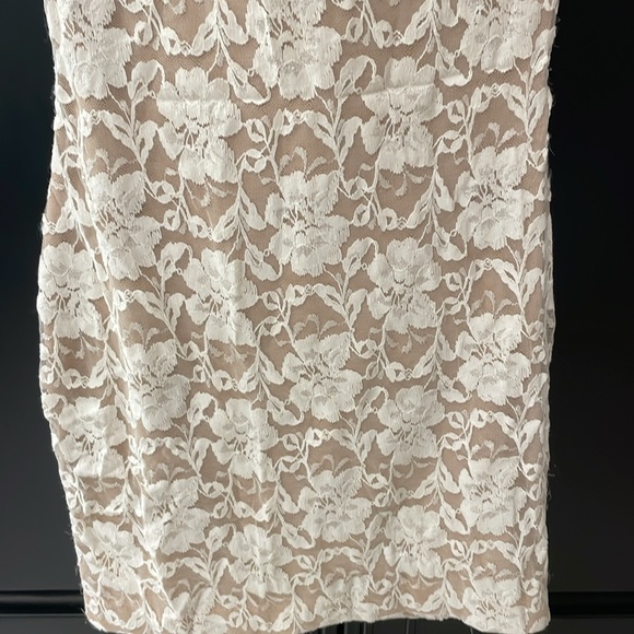 FLORAL MINI DRESS! NUDE COLOR AND WHITE FLORAL! Size: small! Racerback with zip! - Picture 6 of 12